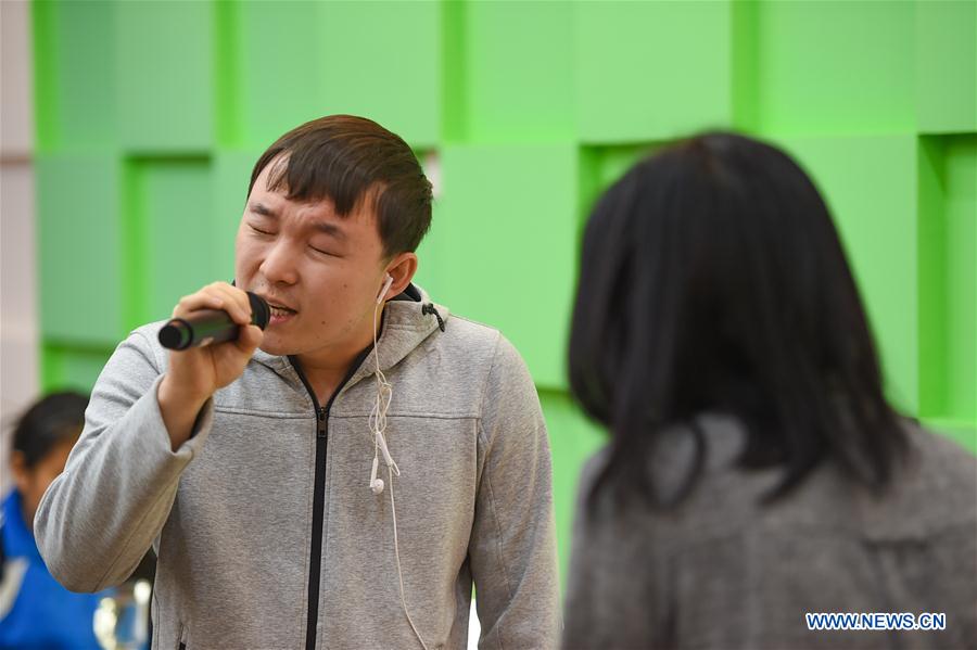 CHINA-INNER MONGOLIA-HOHHOT-VISUALLY IMPAIRED-CINEMA-POEM-VOLUNTEER (CN)