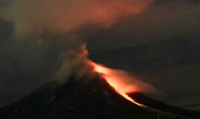 Mount Sinabung spews lava and ash in Indonesia