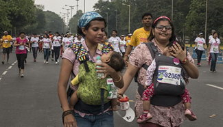 People participate in Pinkathon in Kolkata, India