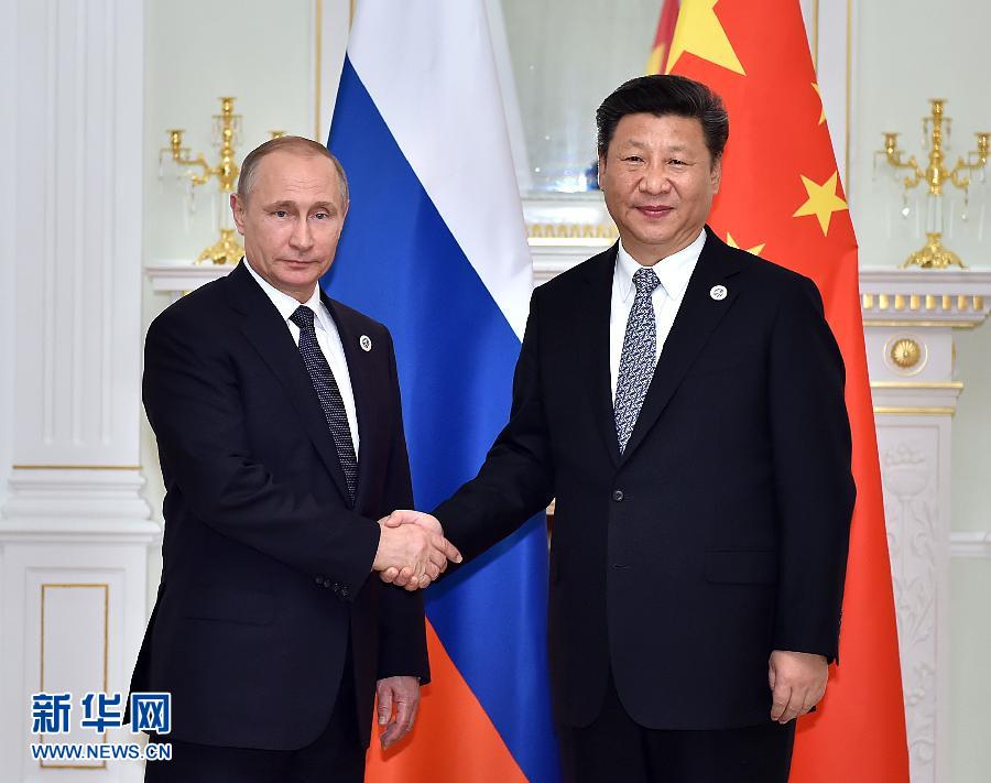 6月23日，國家主席習(xí)近平在烏茲別克斯坦塔什干會(huì)見俄羅斯總統(tǒng)普京。新華社記者李濤攝